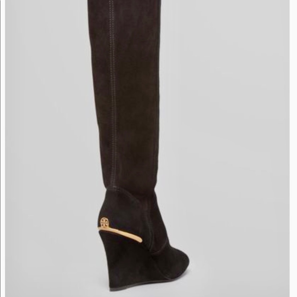 Tory Burch black suede Henson wedge boot.